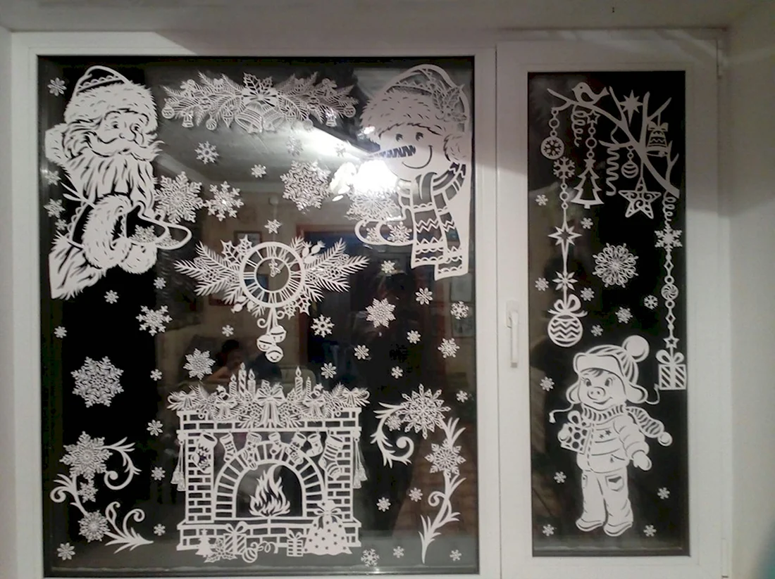 Украсить окно вытыканками снеговиками