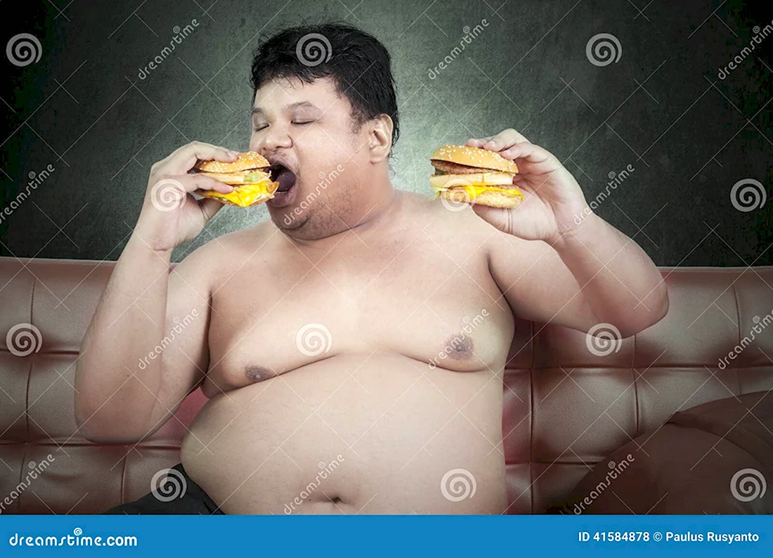 Жирный ест гамбургер