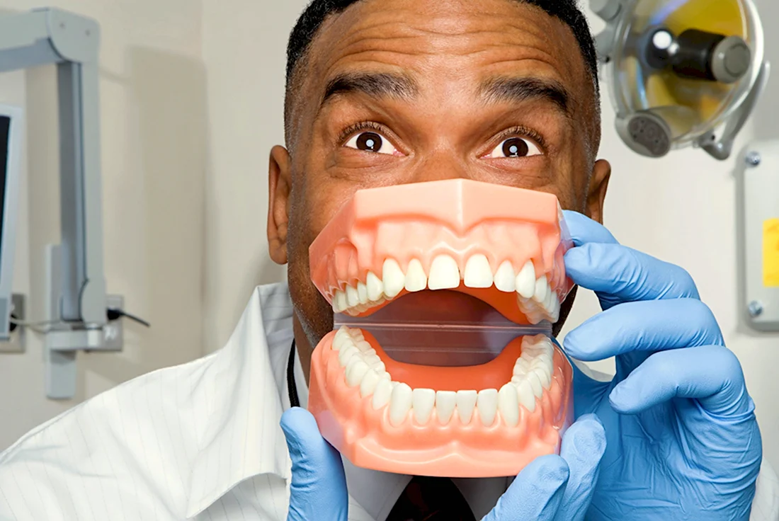 Зубной врач и зубы