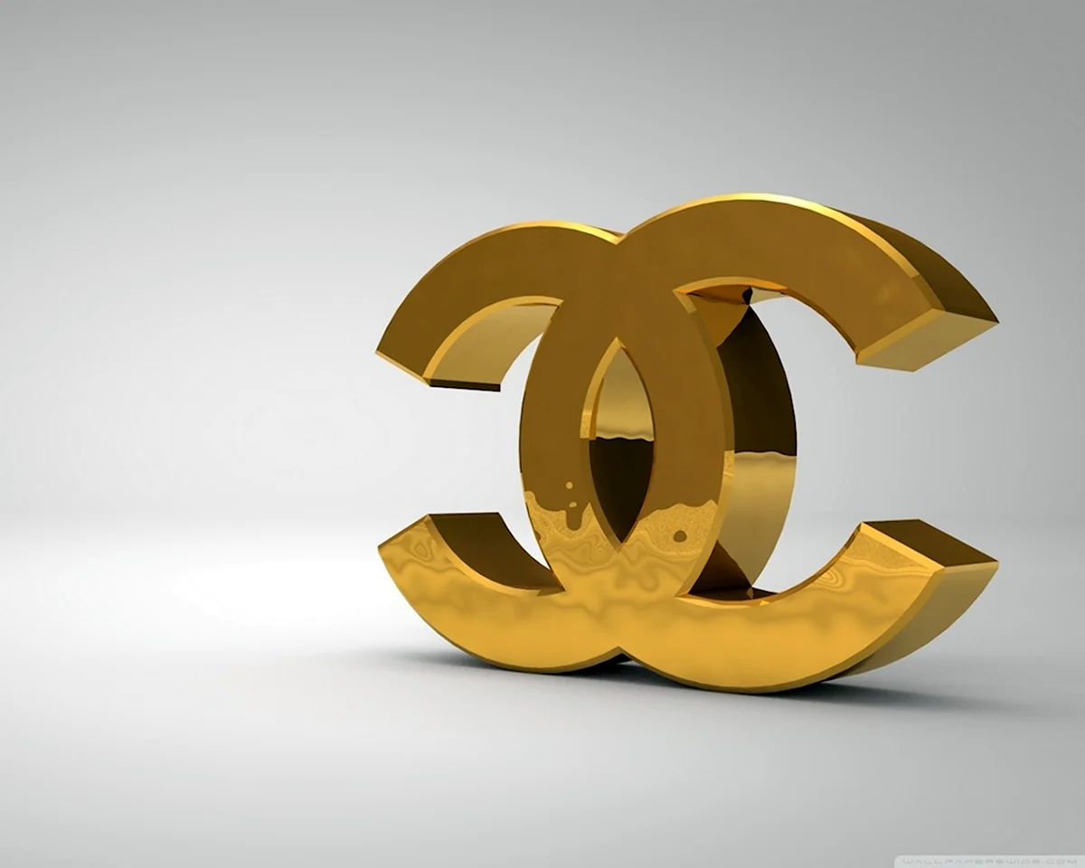 Логотип Шанель в золоте