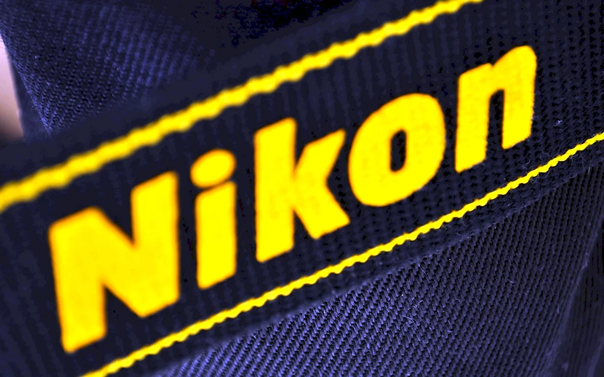 Nikon логотип