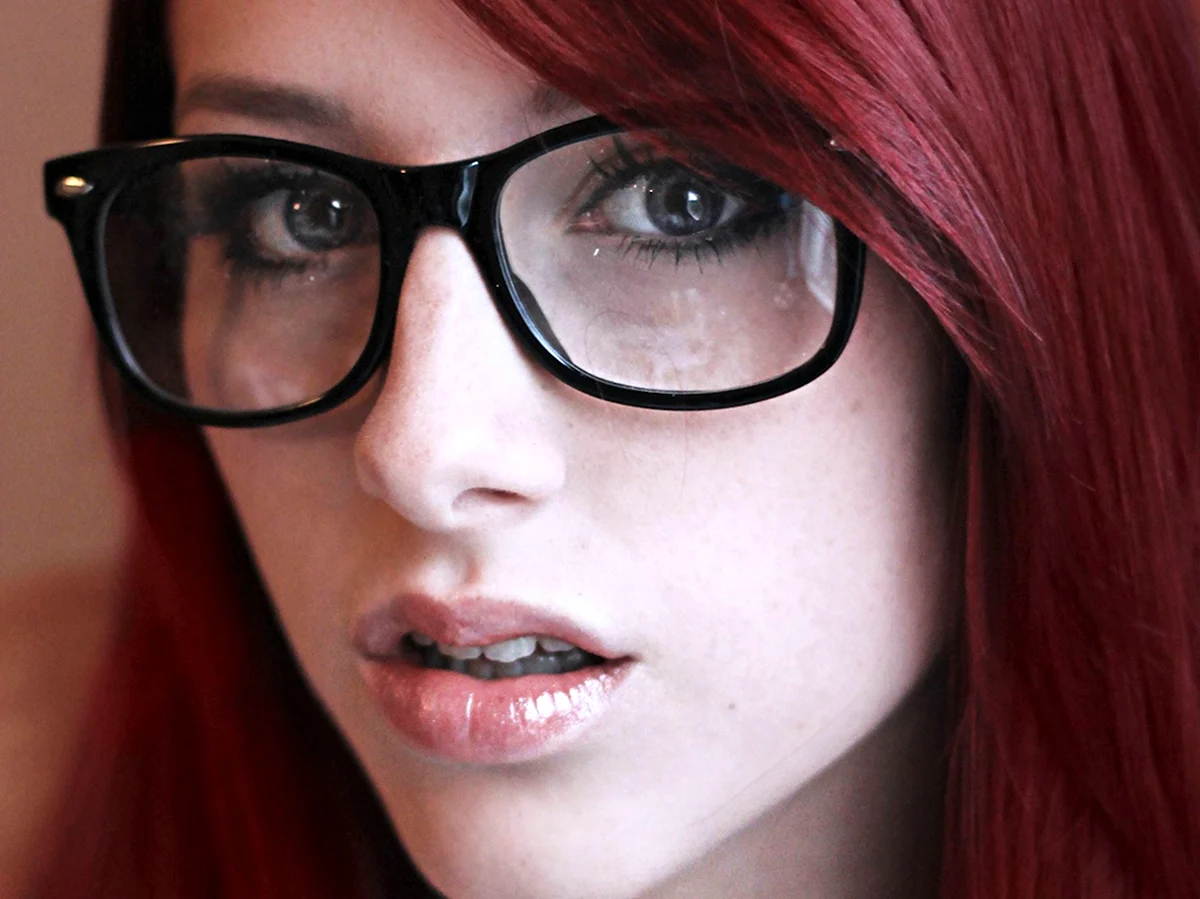 Red head pretty girl in Glasses
